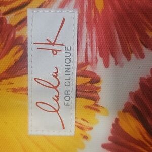 Lulu dk make-up case for clinique. NWOT flowered, yellow pink white and orange.